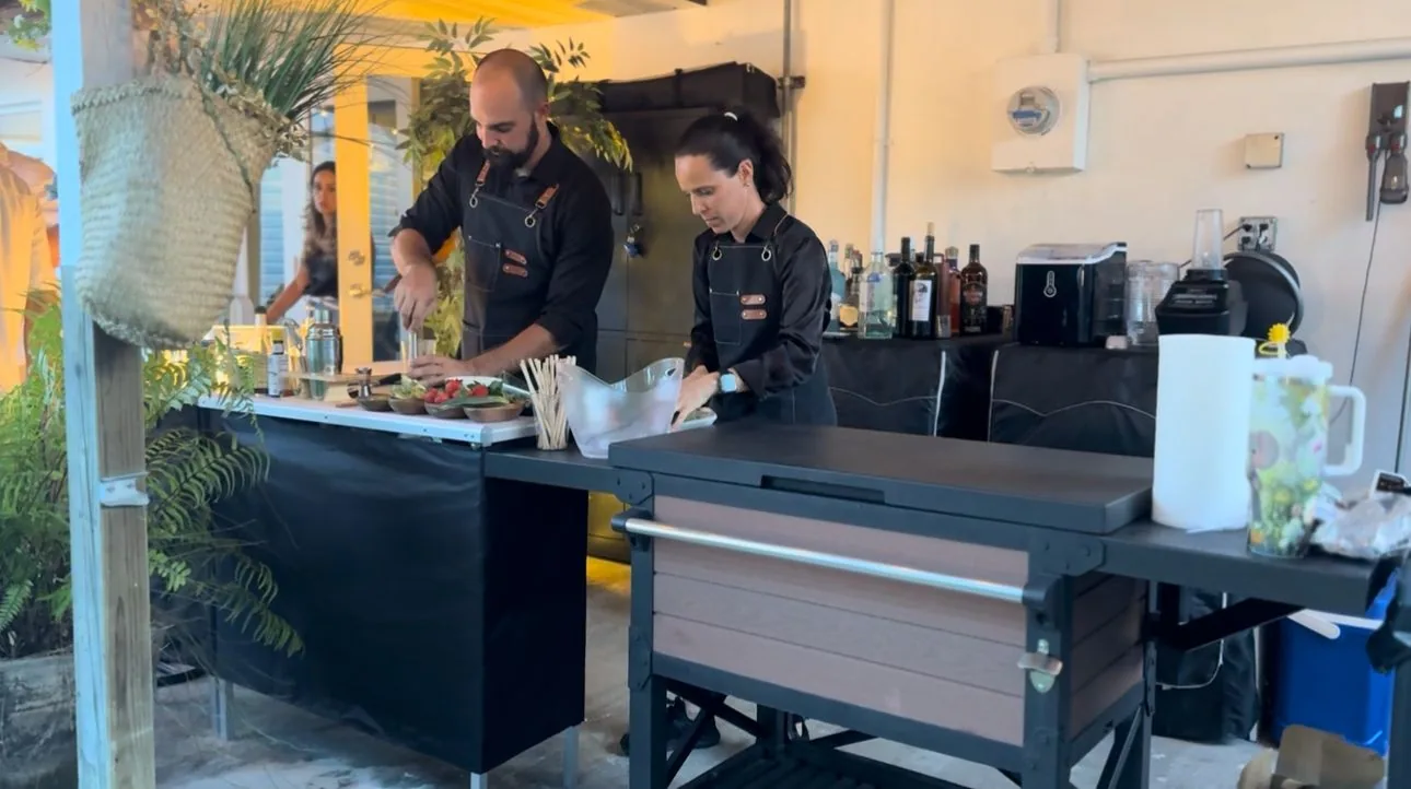 Tipsy Tides team working behind an outdoor mobile bar