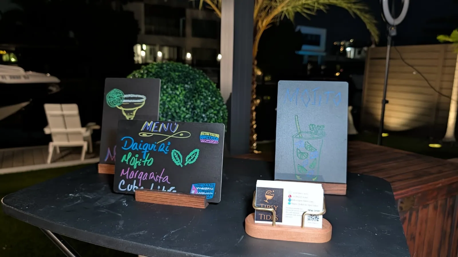 Hand-lettered cocktail menu at a Tipsy Tides event